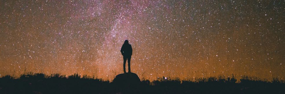 person looking at stars first contact letters