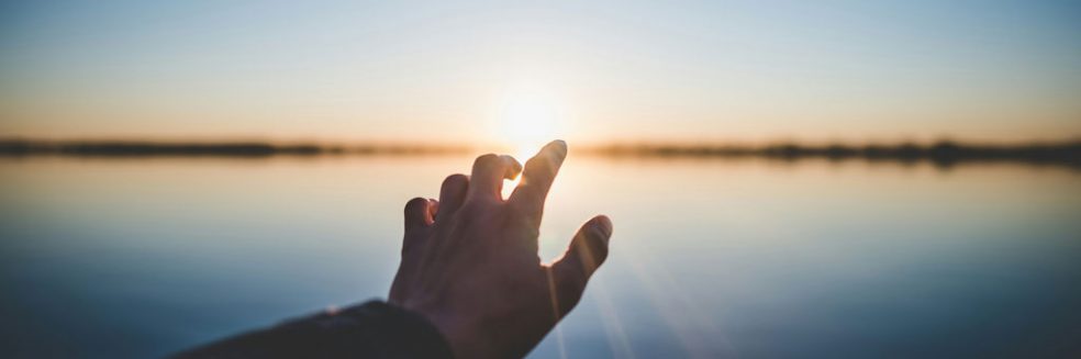 hand reaching toward the sun 38.-Reaching-out-to-Adoptive-Parents